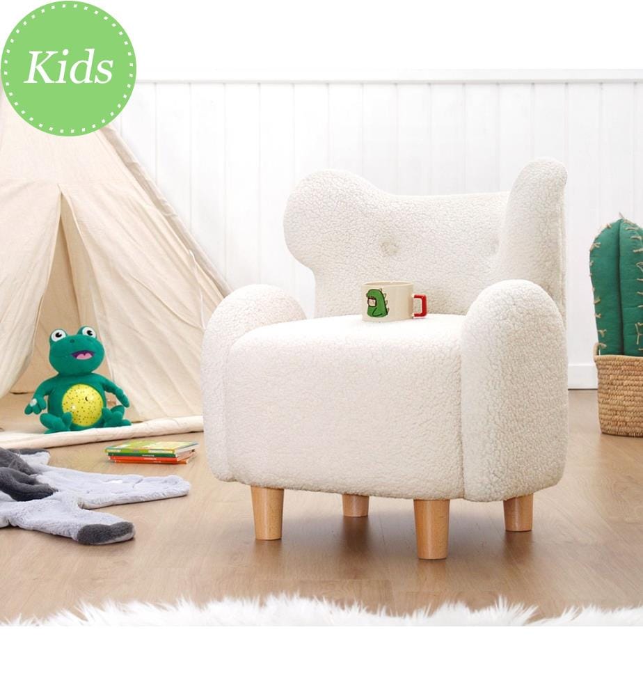 Poltrona a orecchioni per bambini, bianca, 100% pelliccia sintetica, gambe in legno.
