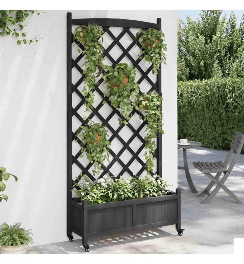 Jardinière avec treillis et roues noir bois massif de sapin