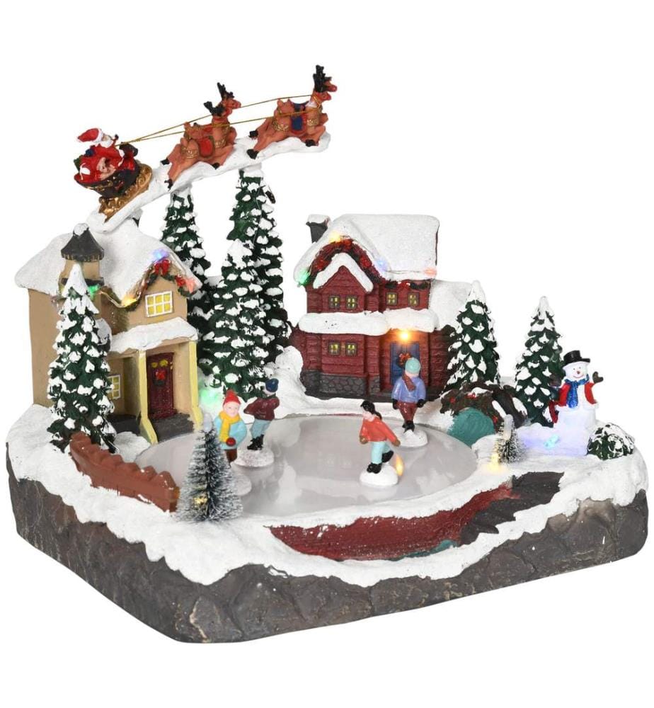 Village de Noël avec des figurines articulées et 13 LED colorées