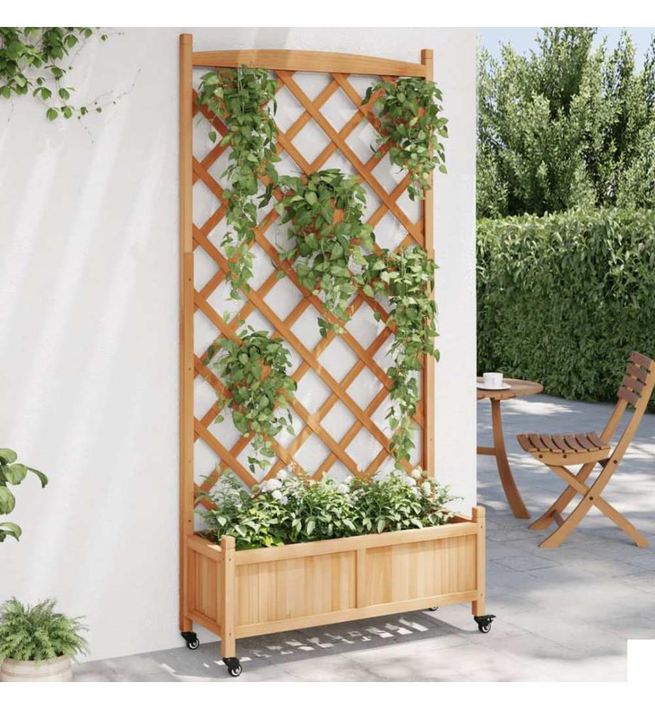 Jardinière avec treillis et roues marron bois massif de sapin
