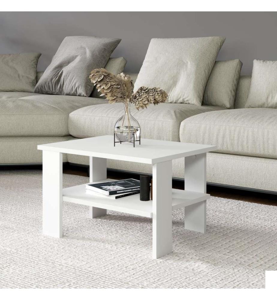 Table basse blanche en panneaux de particules 100 % mélaminés.
