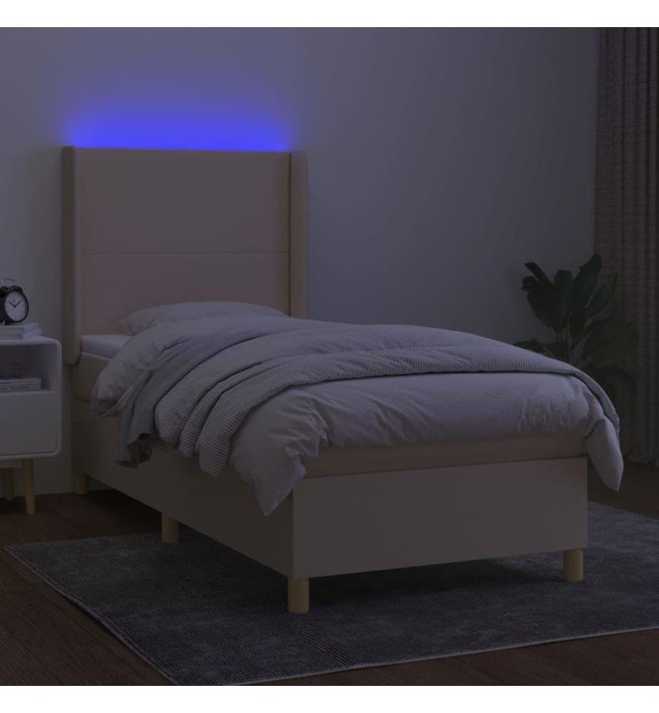 Sommier tapissier avec matelas et LED Crème 90x190 cm Tissu