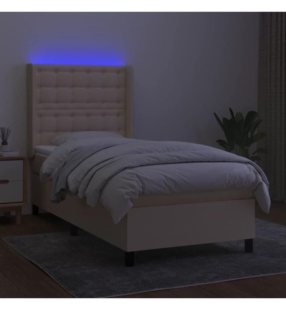 Sommier tapissier avec matelas et LED Crème 90x190 cm Tissu