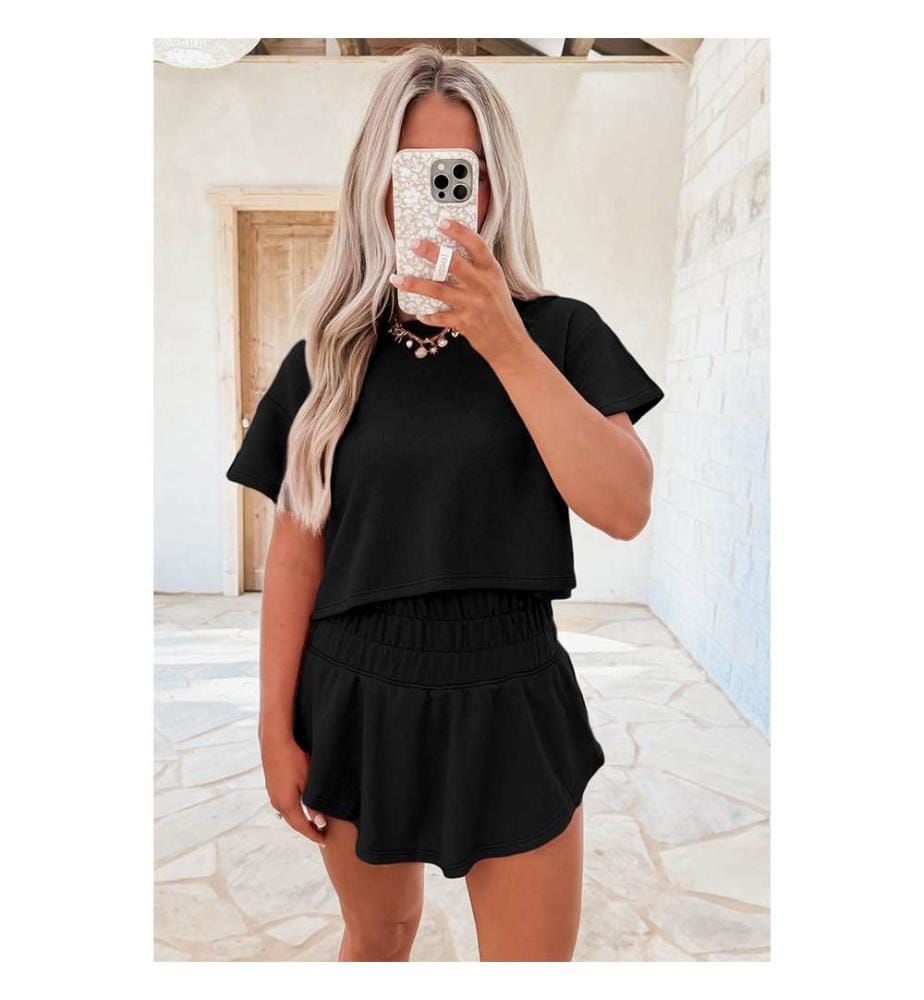 2-teiliges schwarzes Set mit kurzem T-Shirt und hochgeschnittenem Rüschenrock - Schwarz