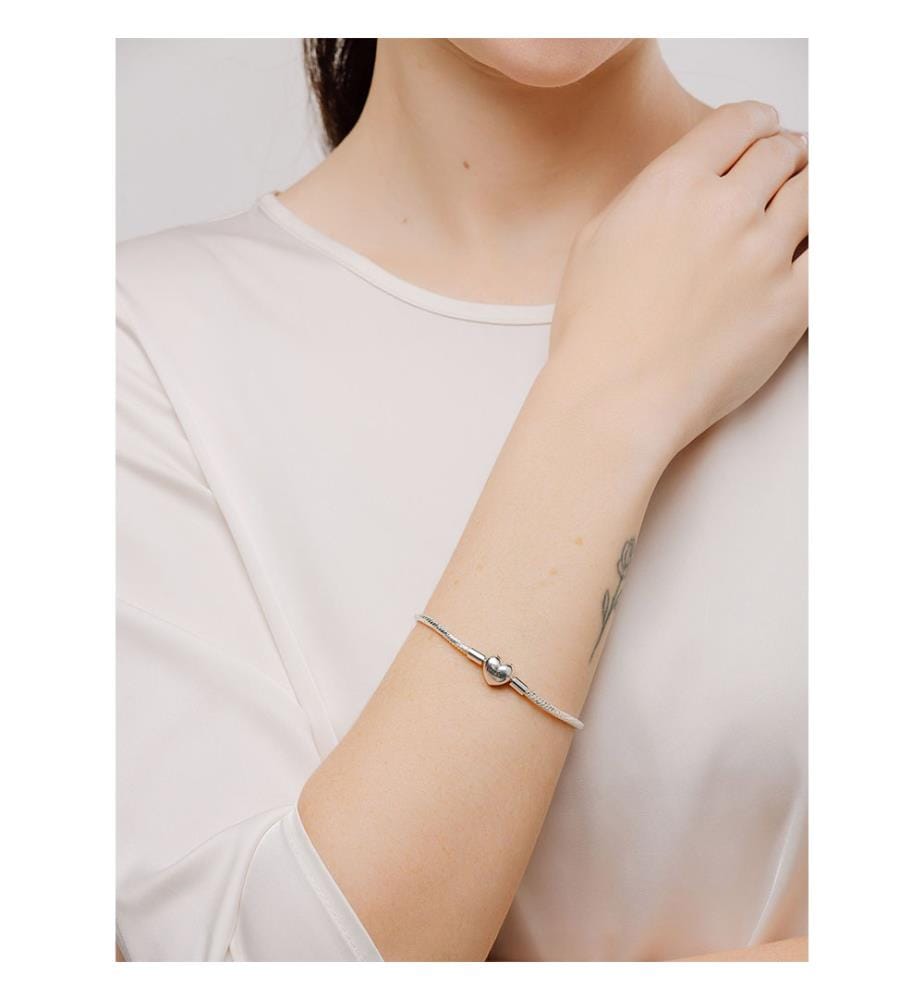 Schlangenketten-Armband mit facettierten Gliedern und Herz-Schliesse - Silber