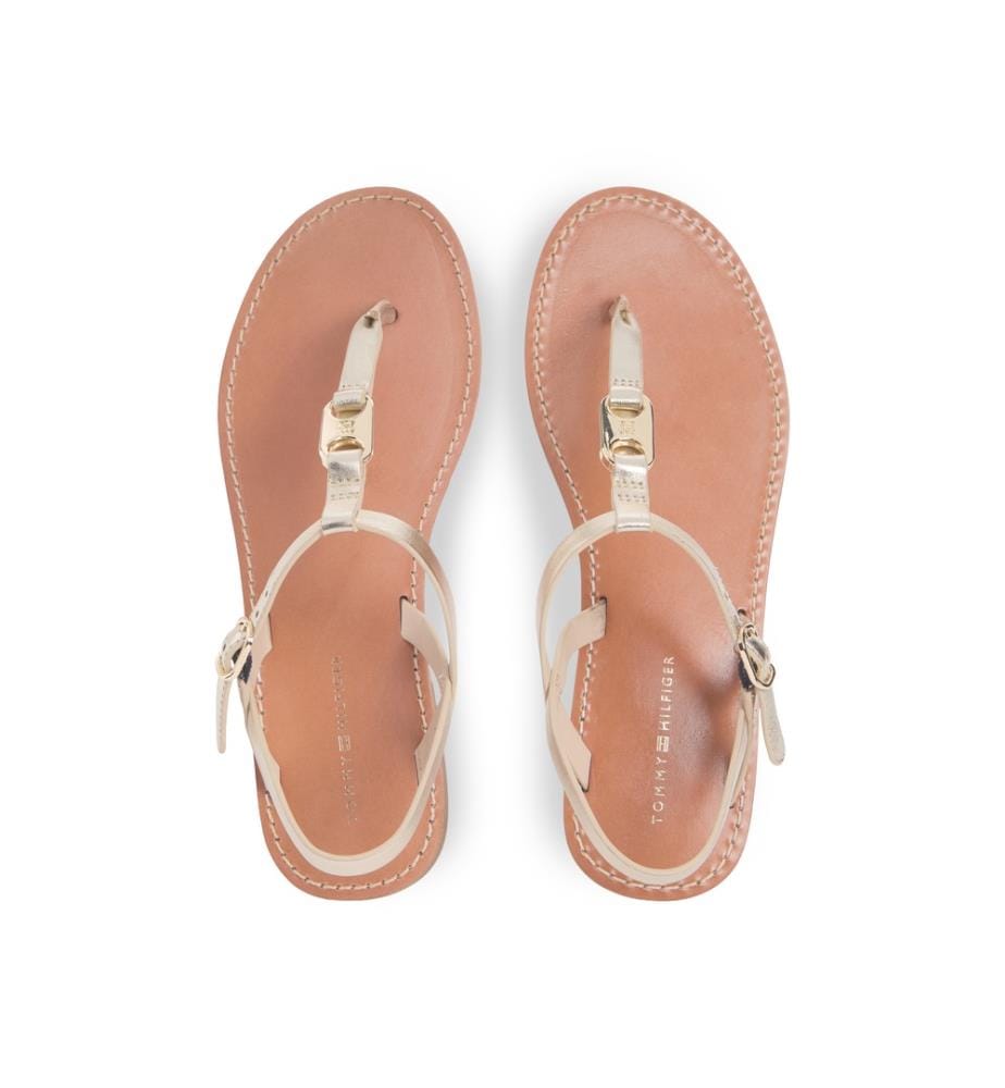 Flache Sandalen mit Zehensteg aus Metallic-Leder – Gold