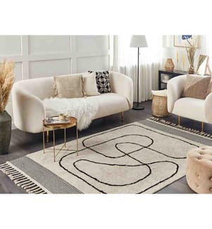 Teppich aus Baumwolle in Beige und Schwarz 140 x 200 cm Abstraktes Muster Moderner Niedrigflor mit Fransen