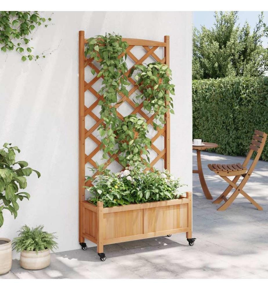 Jardinière avec treillis et roues marron bois massif de sapin