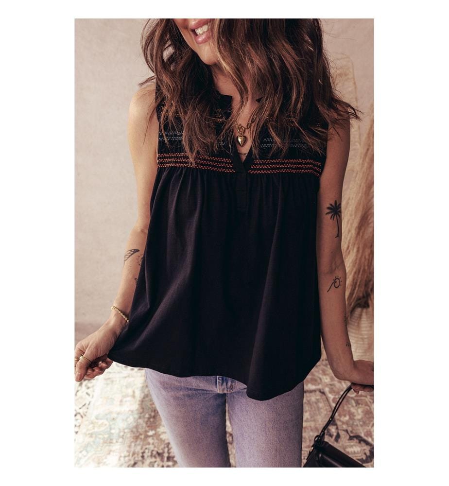 Black tank top with notched V-neck and colorful gathered yoke