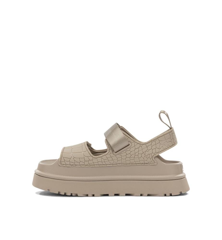 „Goldenglow Embossed“ Flache Sandalen – Beige