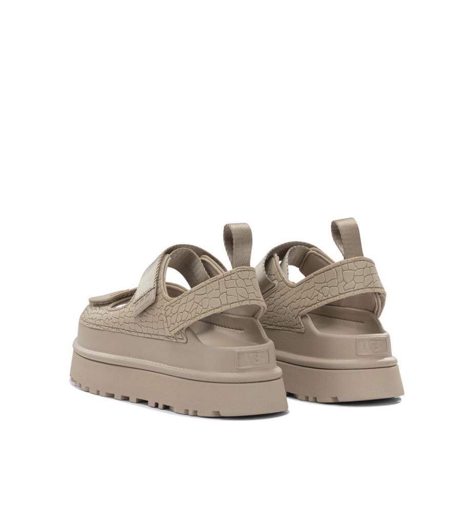 „Goldenglow Embossed“ Flache Sandalen – Beige