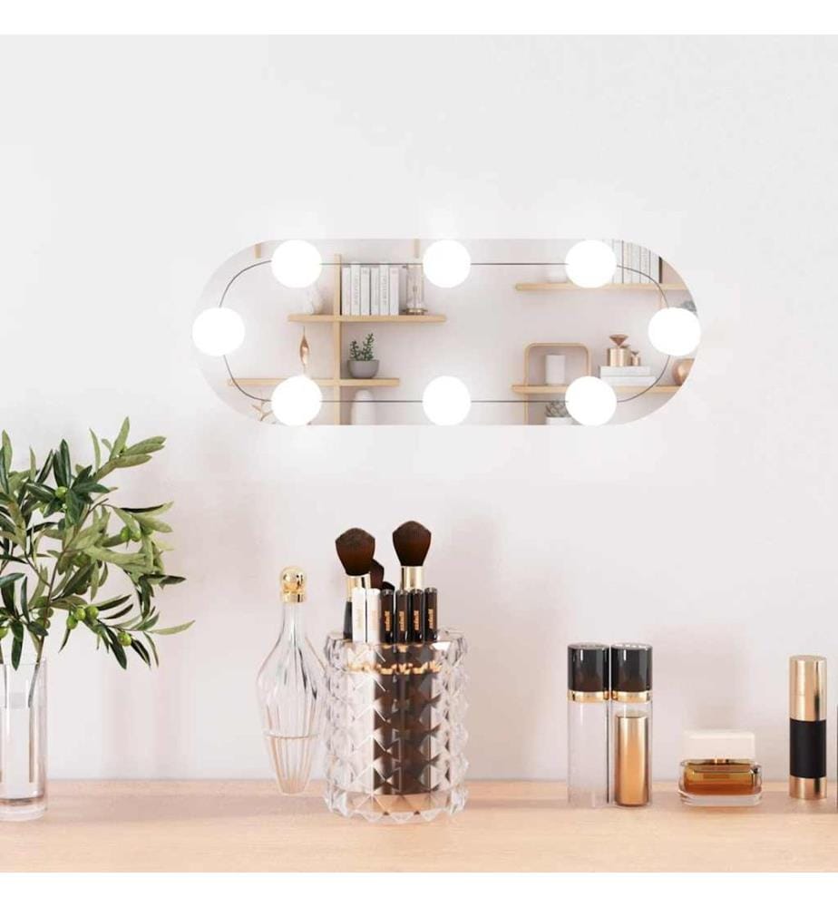 Wandspiegel mit LED-Leuchten 15x40 cm Glas Oval