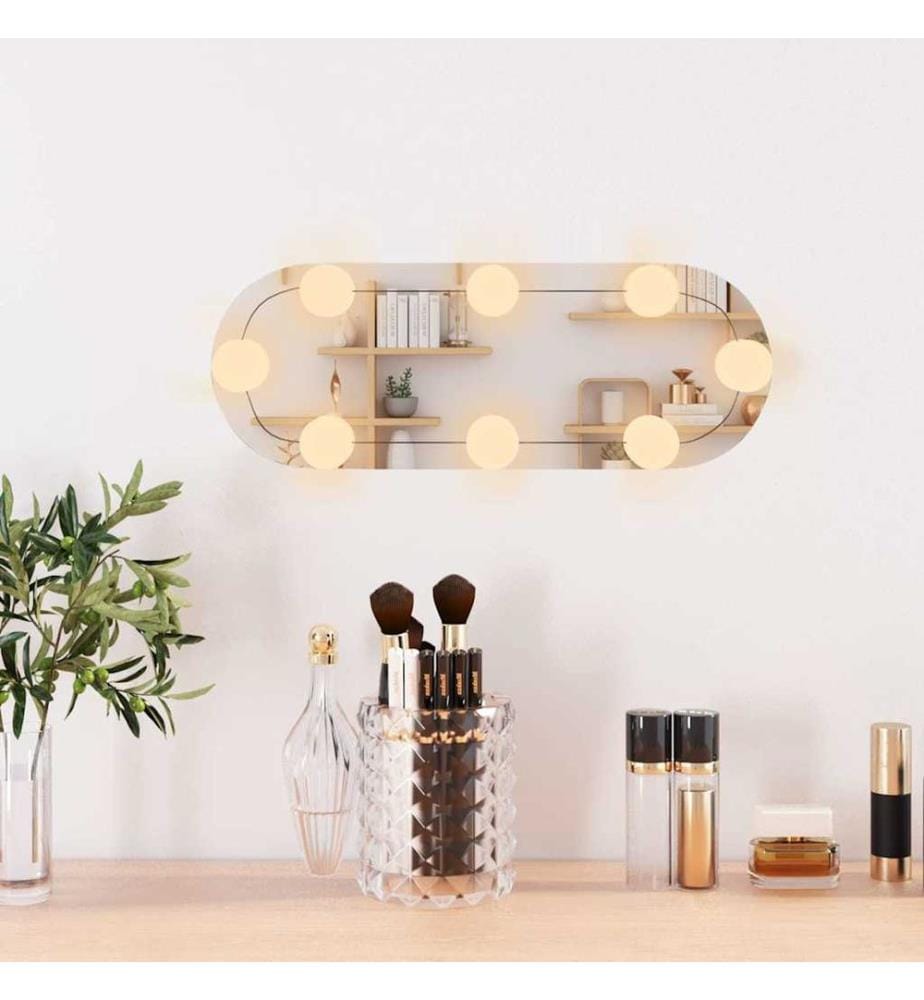 Wandspiegel mit LED-Leuchten 15x40 cm Glas Oval