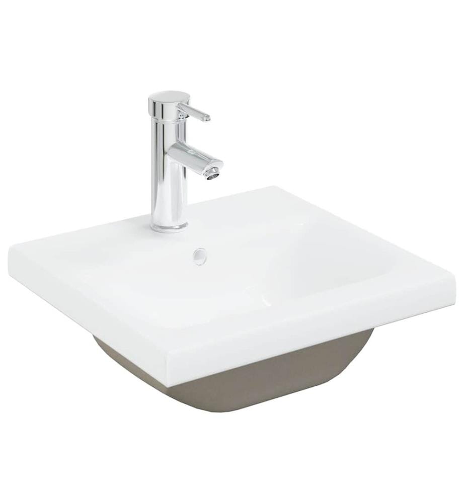 Waschbeckenunterschrank mit Einbaubecken und Wasserhahn