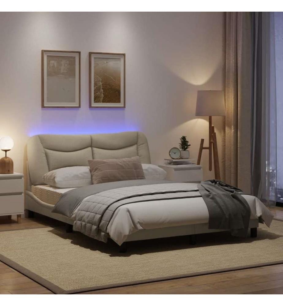 Cadre de lit avec lumières LED crème 120x200 cm tissu