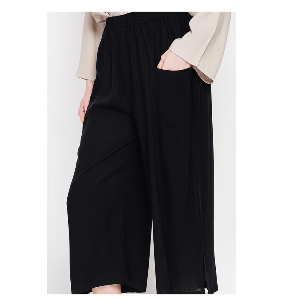 Pantaloni a vita alta a gamba larga con tasche frontali - Nero