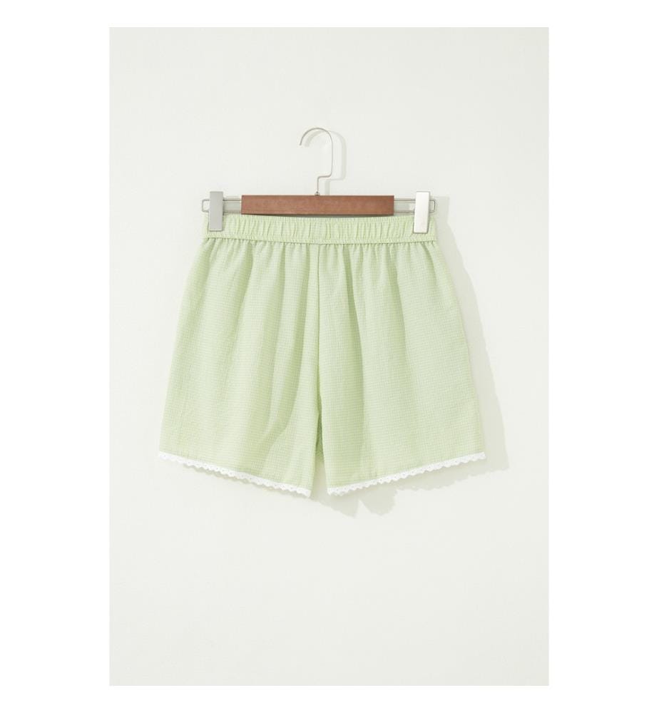 Green Vichy-check shorts with buttons and lace trim