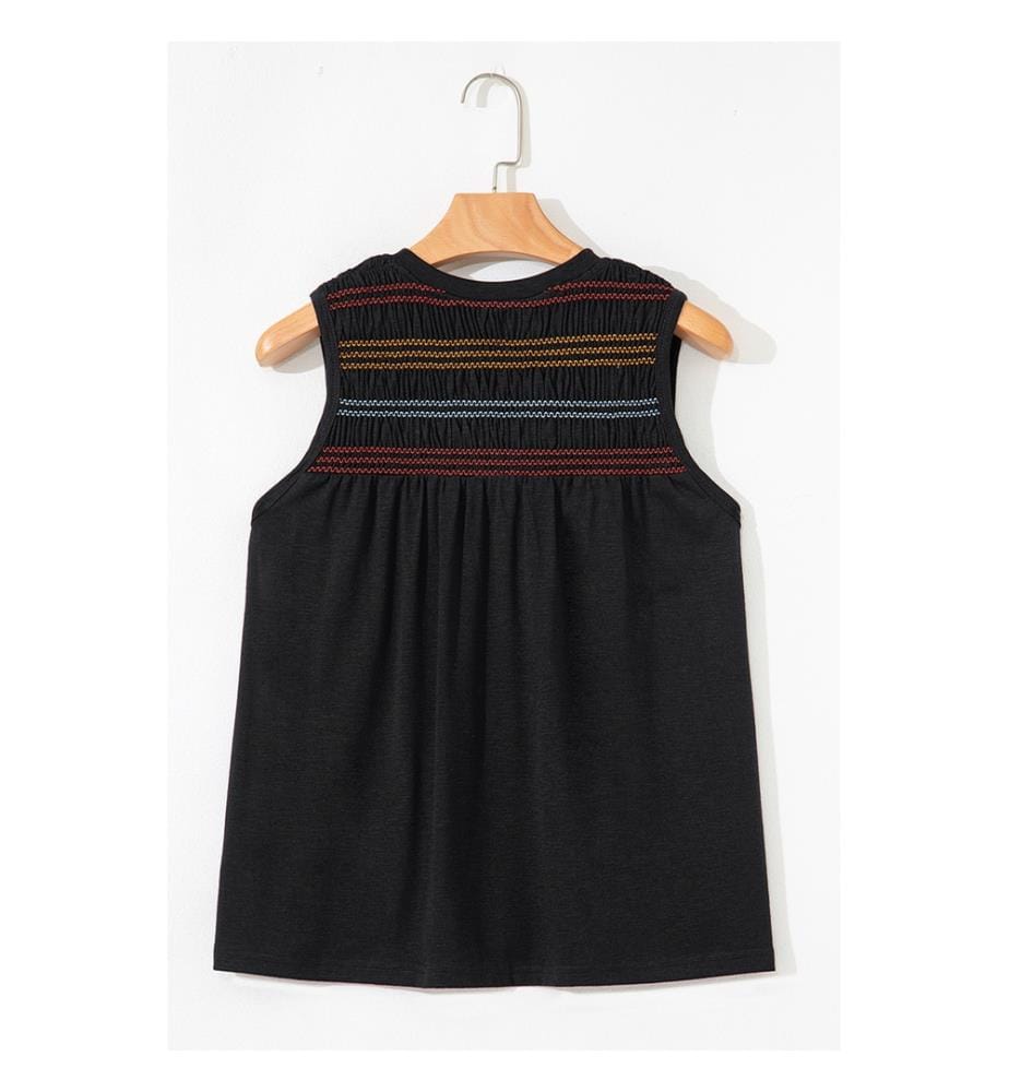 Black tank top with notched V-neck and colorful gathered yoke
