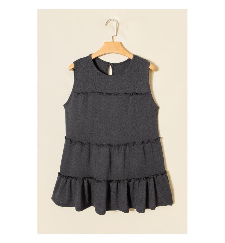 Dark grey trapeze tank top with overlapping ruffles