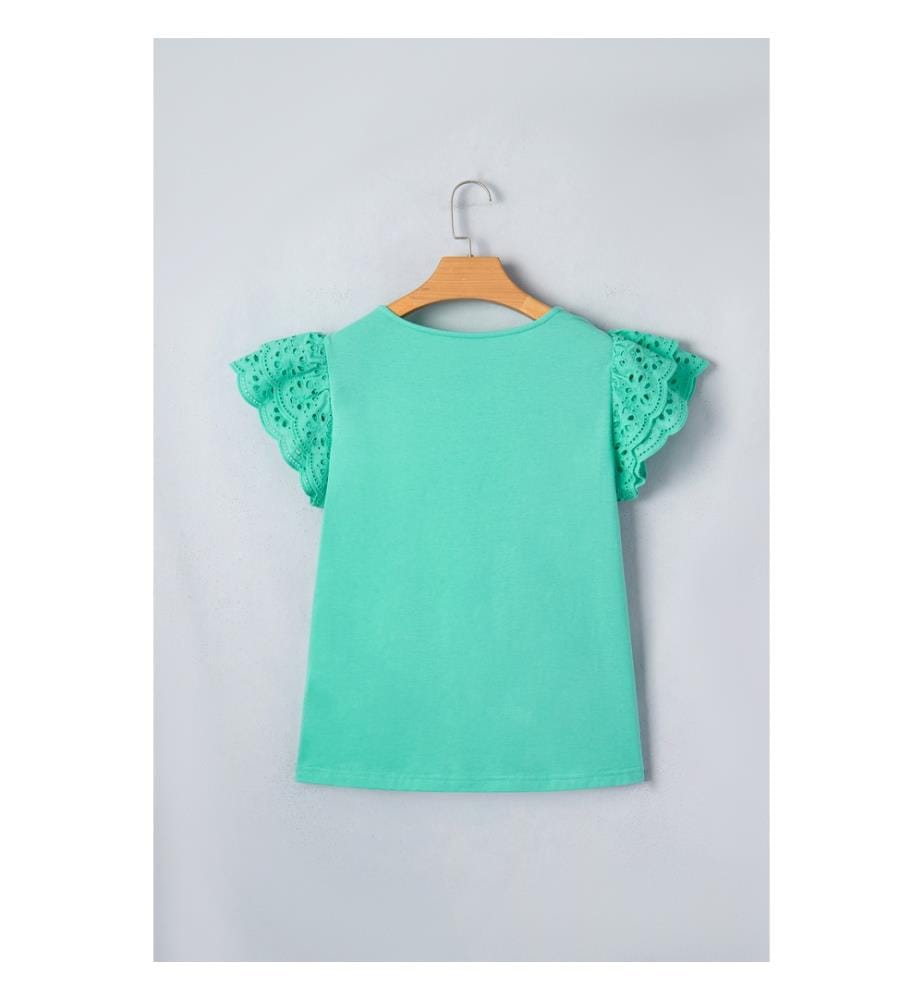 Short-sleeved ruffled top in mint green openwork lace