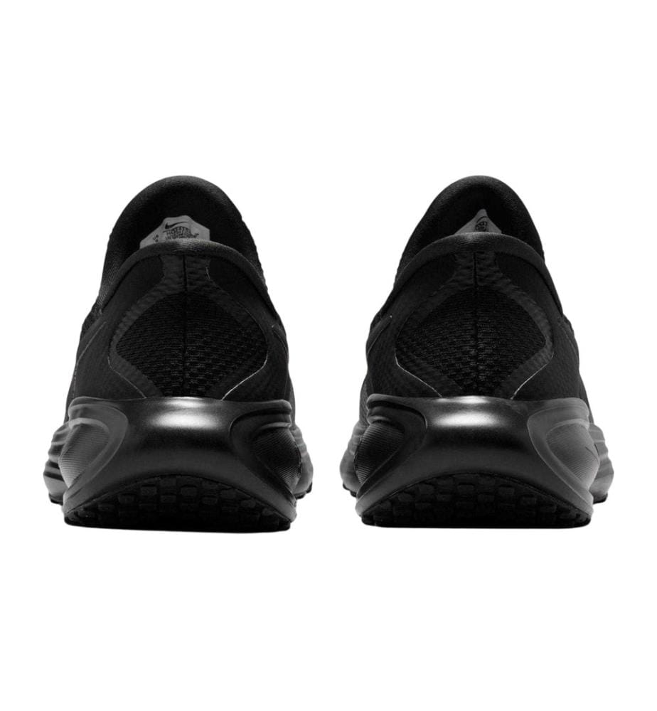 Nike - Baskets motif/style logo REVOLUTION - Femme
