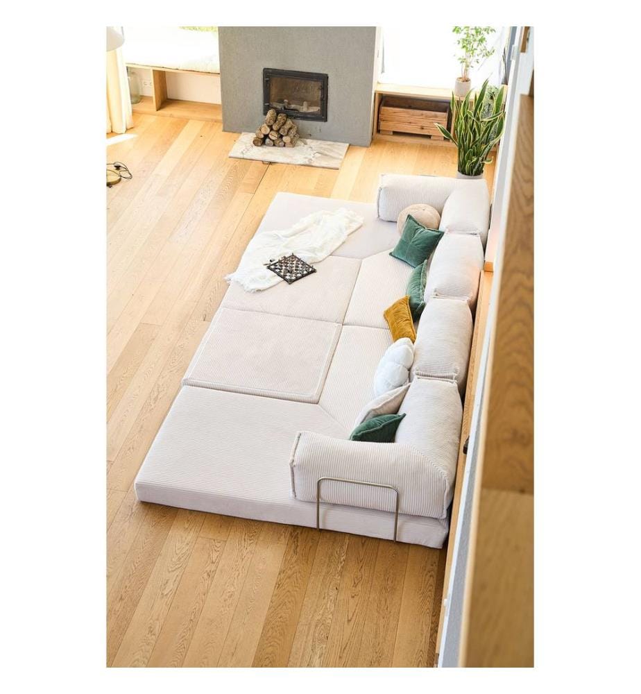 Divano letto angolare, tessuto felpato a coste 100%, color crema.
