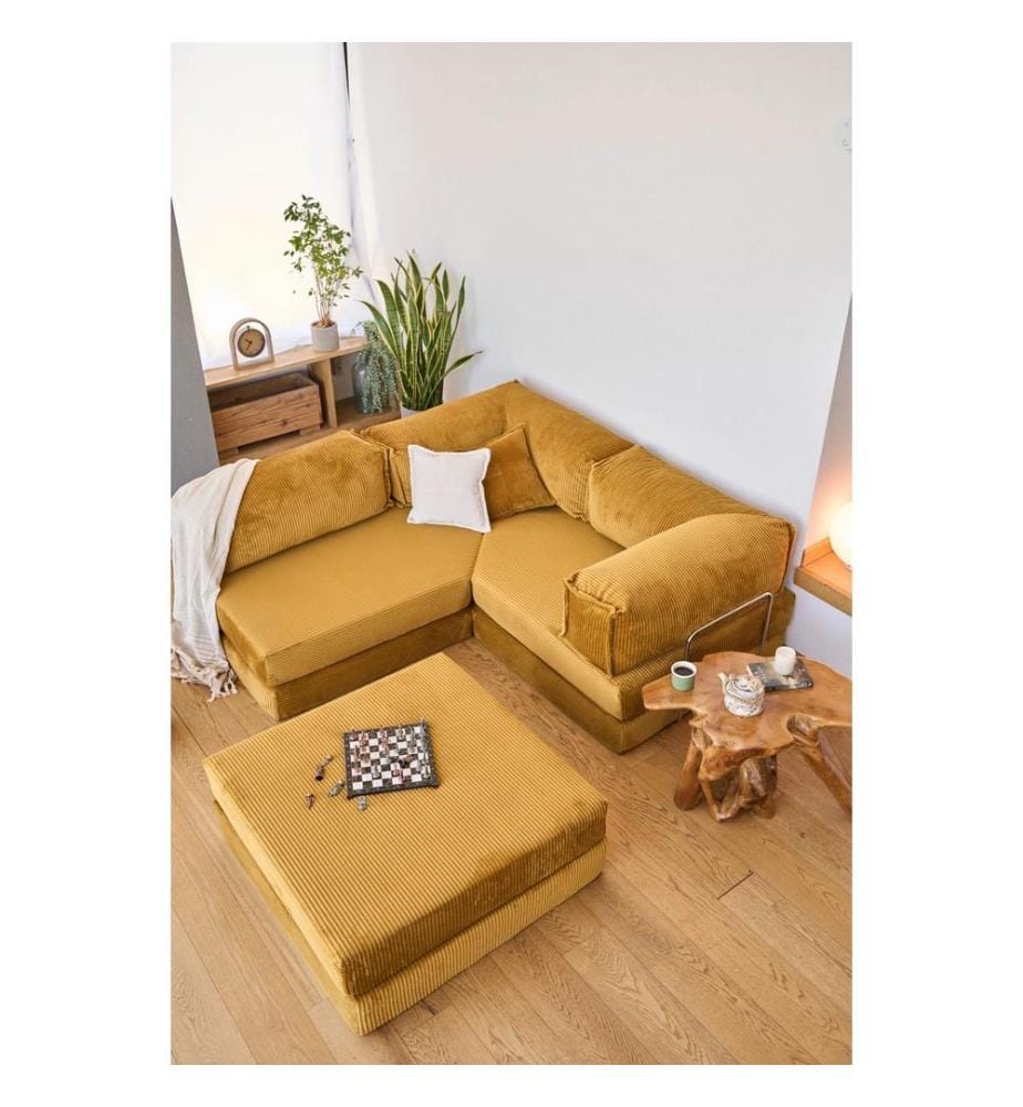 Divano letto angolare, tessuto felpato a coste 100%, color senape.
