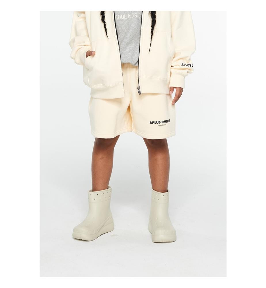 Pantaloncini in felpa con logo sovrapposto e coulisse - Crema