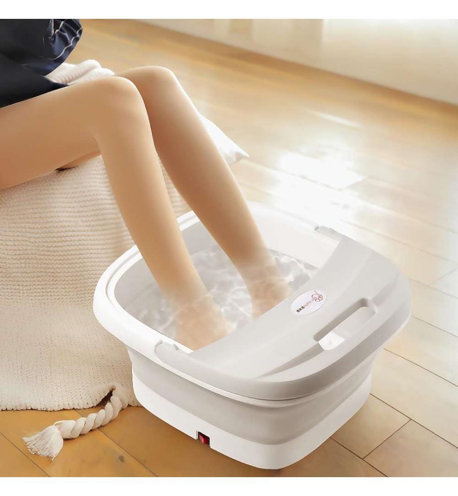 Masseur de pieds pliable avec chauffage constant par lumière rouge.
