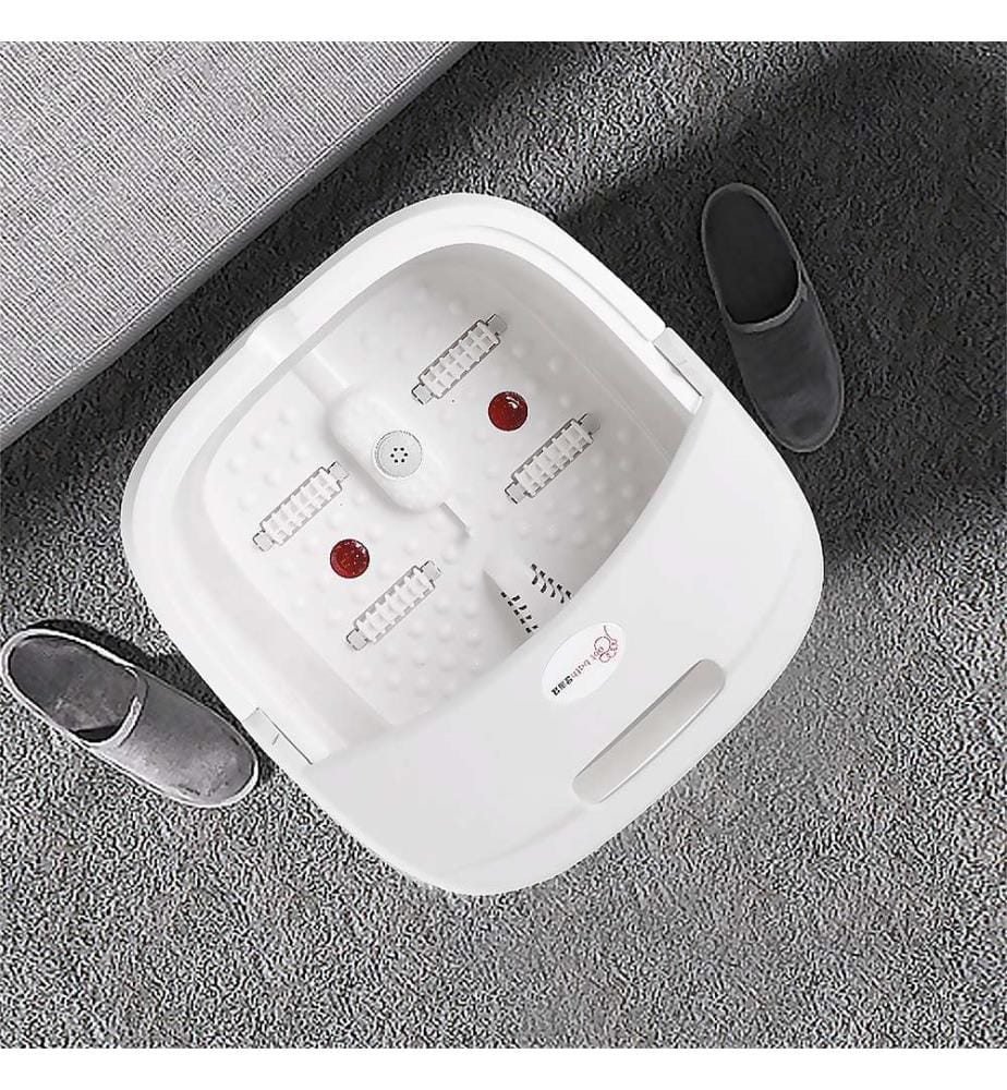 Masseur de pieds pliable avec chauffage constant par lumière rouge.