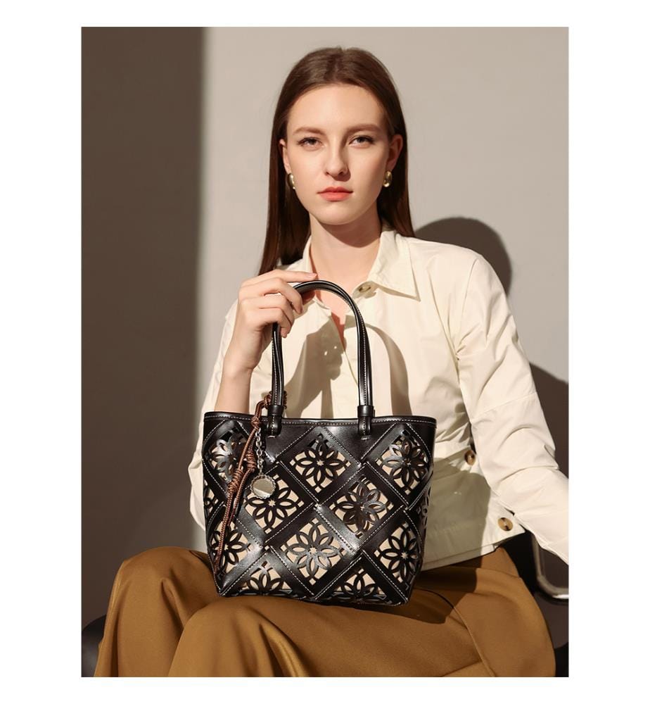 Venetia Handtasche aus Leder mit Lochmuster - Schwarz