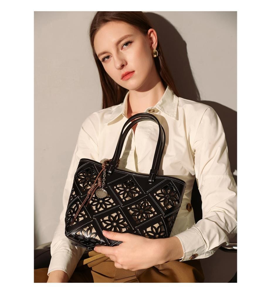 Venetia Handtasche aus Leder mit Lochmuster - Schwarz