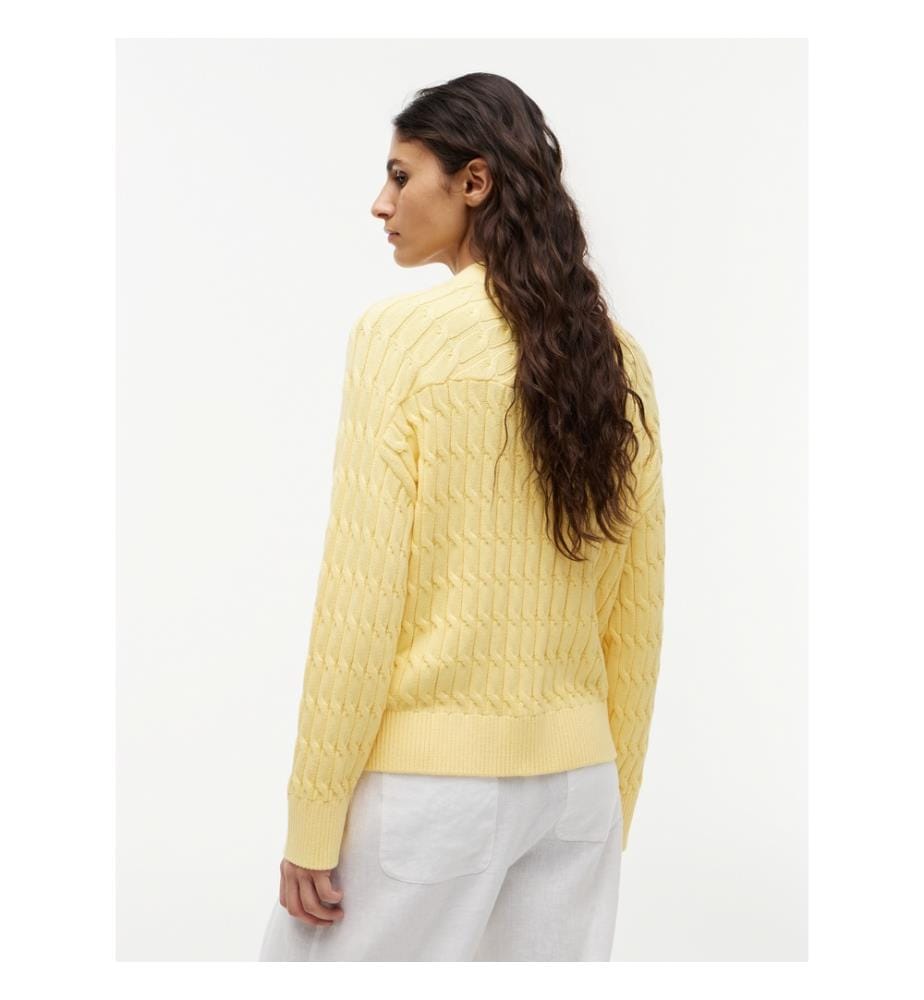 Oversized cardigan with a V-neck and cable knit pattern
