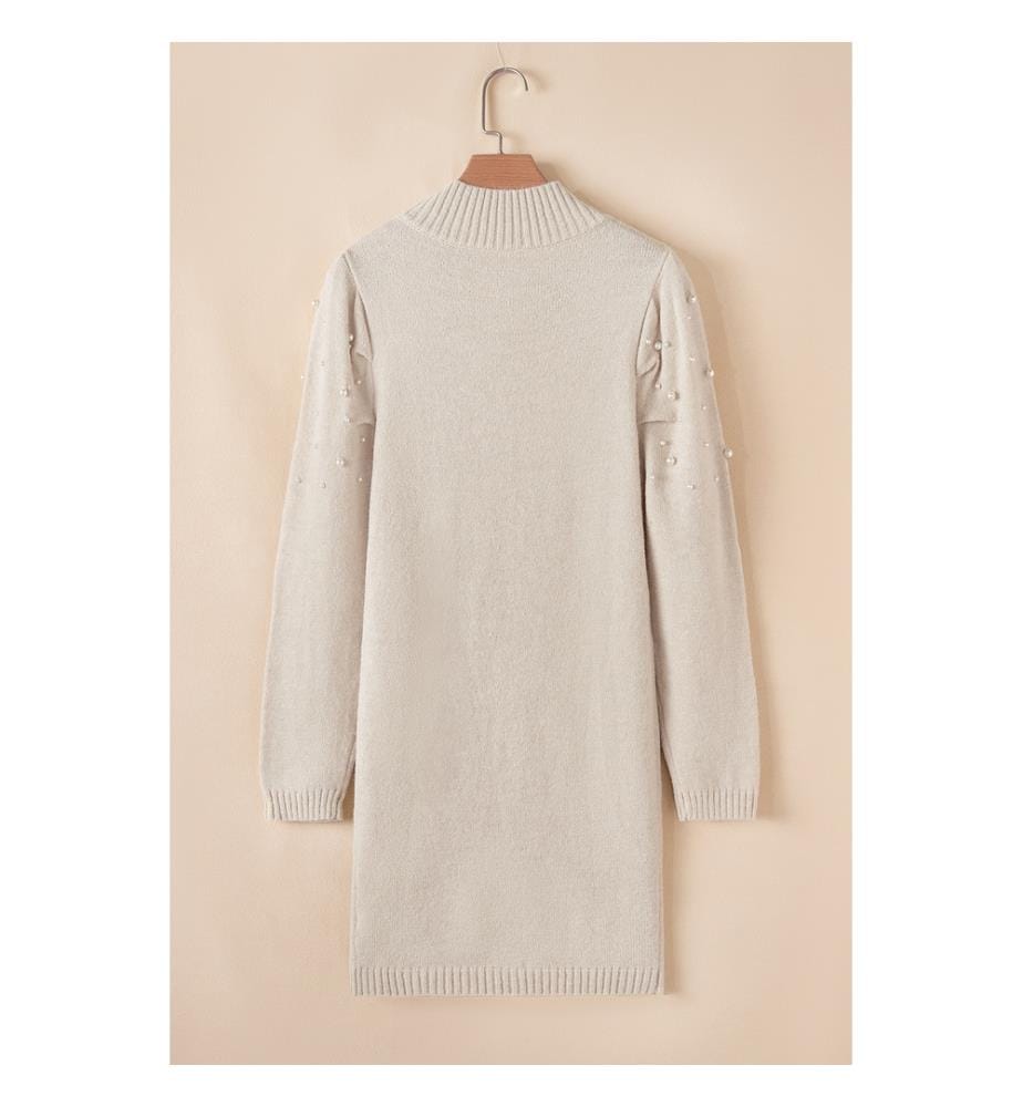 Eng anliegendes Pulloverkleid mit Stehkragen und Perlen aus Pergament